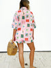 Trendige Sommer-Kombi aus bunter Bluse und Shorts - SonneSet