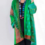 Herbstliche Boho-Strickjacke mit buntem Herbstmuster – Maravilla