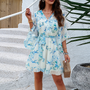 Verspieltes Minikleid mit Blumenmuster & Glockenärmeln – Liora