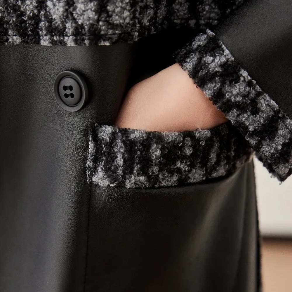 Schwarzer Wollmantel mit Knopf und Tasche, elegantes Design, Wintermode für Damen.