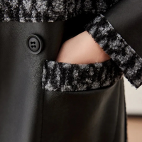 Schwarzer Wollmantel mit Knopf und Tasche, elegantes Design, Wintermode für Damen.