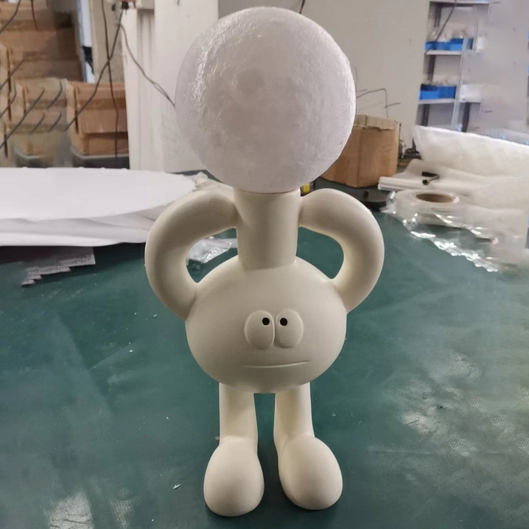 Verspielte Tischlampe mit Glasball - Glombra