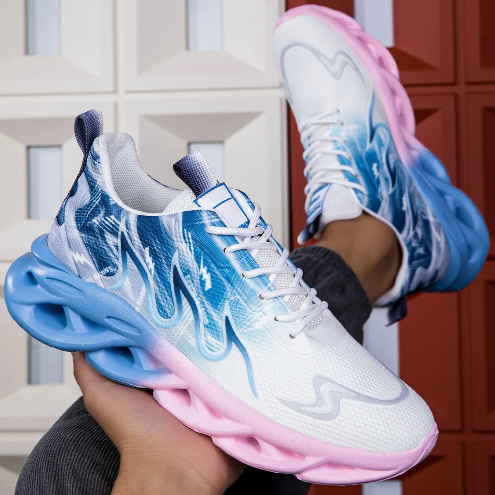 Weiße Sneaker mit blau-rosa Sohle, sportliches Design, atmungsaktives Material, modisch.