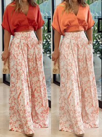 Two-piece summer outfit with loose blouse and wide-cut pants – Élise