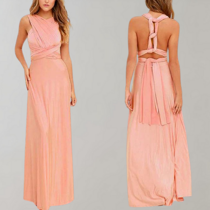 Rosa festliches Damen-Wickelkleid, ärmellos, bodenlang, elegantes Design für Hochzeiten.