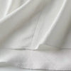 Weiße luftige & stylische ärmellose Leinenbluse für Damen – Amira
