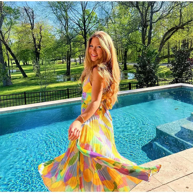 Printed summer dress with deep neckline and bow detail – Vivienne