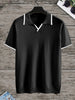 Schwarzes Polohemd mit weißem Kragen, kurzärmelig, aus Baumwolle, Herrenmode.
