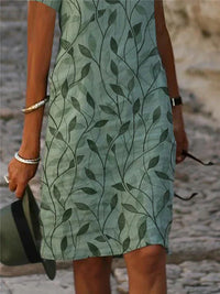 Enchanting Dress with Magical Design in Emerald Green - GreenAura