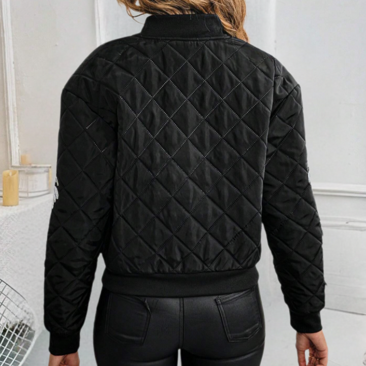 Schwarze gesteppte Damenjacke, modisch, warm, ideal für Herbst und Winter, Rückansicht.