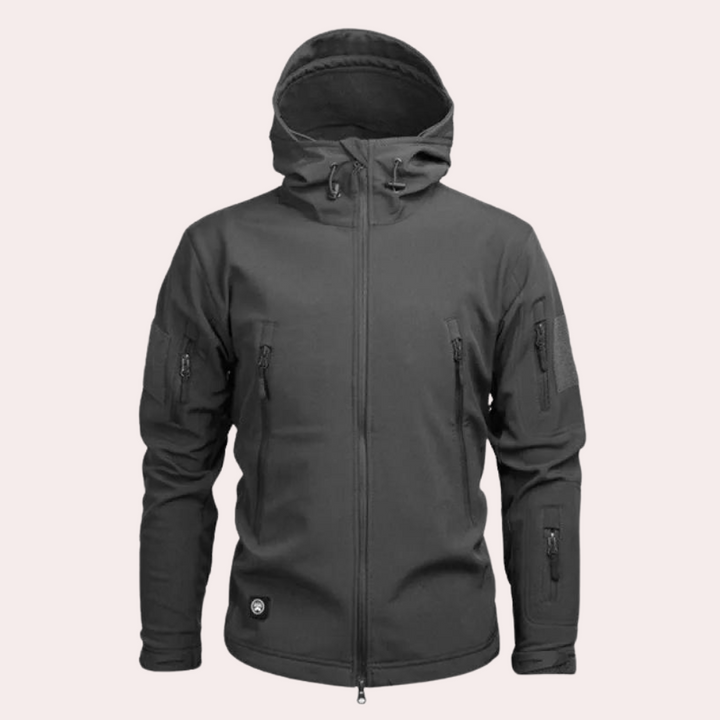 Graue Softshell-Jacke mit Kapuze, Reißverschlusstaschen, wetterfest, Outdoor-Bekleidung.