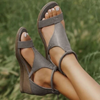 Graue Damen-Sandalen mit Keilabsatz, bequemes Design, ideal für Sommermode.