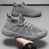 Grauer Sneaker für Herren, atmungsaktiv, rutschfest, sportlich, modisch, bequem.