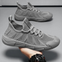 Grauer Sneaker für Herren, atmungsaktiv, rutschfest, sportlich, modisch, bequem.