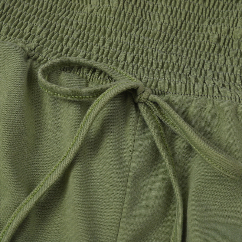 Grüne Jogginghose mit elastischem Bund und Kordelzug, Baumwolle, bequem, Freizeitkleidung.