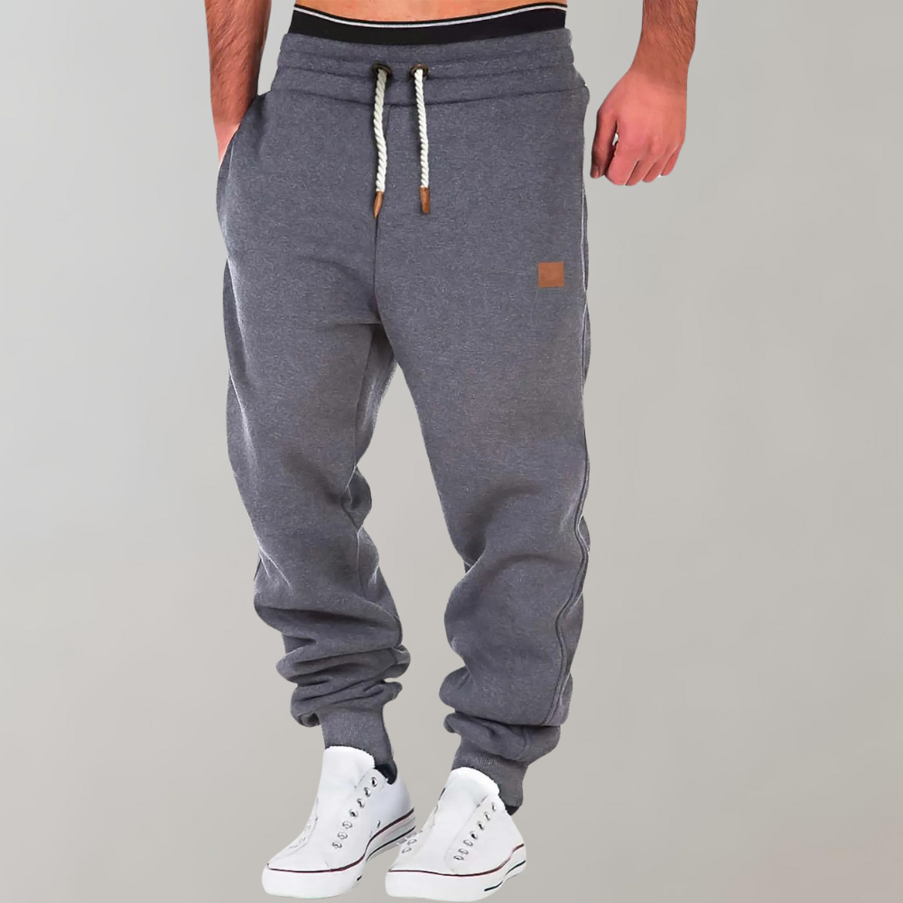 Graue Herren-Jogginghose mit Kordelzug, bequem, sportlich, Baumwolle, Freizeitmode.