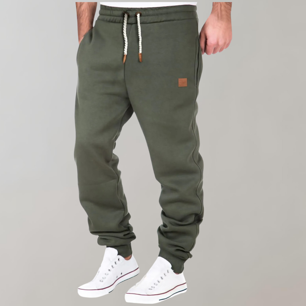 Grüne Herren-Jogginghose, Baumwolle, Kordelzug, bequem, sportlich, Freizeitmode.