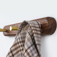 Wall-mounted wooden coat rack with brass hooks - LignaHook