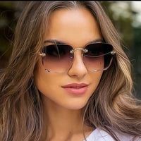 Trendige Randlose Sonnenbrille mit UV400-Schutz in Vintage-Optik – Clea