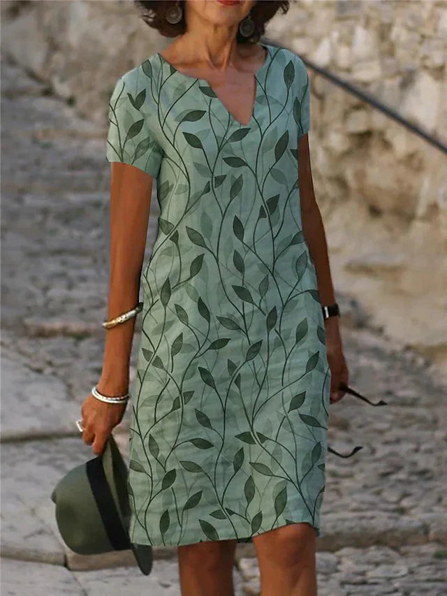 Bezauberndes Kleid mit zauberhaftem Design in Smaragdgrün - GrüneAura